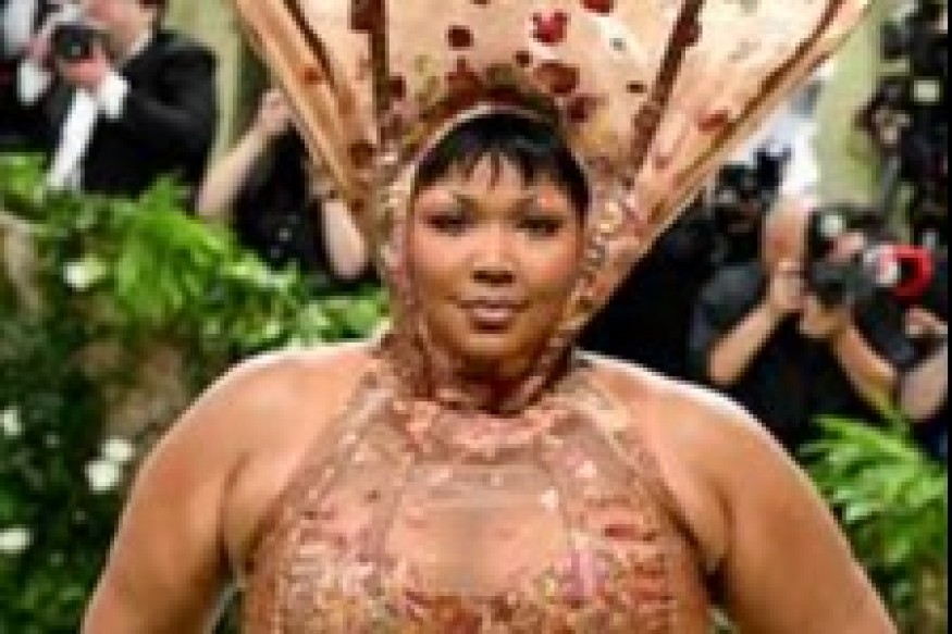 Lizzo reveals 'dark cloud' is clearing after depression battle
